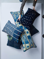 velvet backed baulé ikat cushion by nomad design